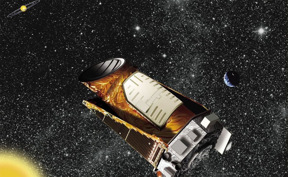 An artist's concept of the Kepler space telescope against a field of stars.